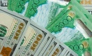 Тенге продолжил укрепляться к доллару на дневных торгах