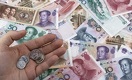 Юань и доллар подешевели на утренней биржевой сессии 